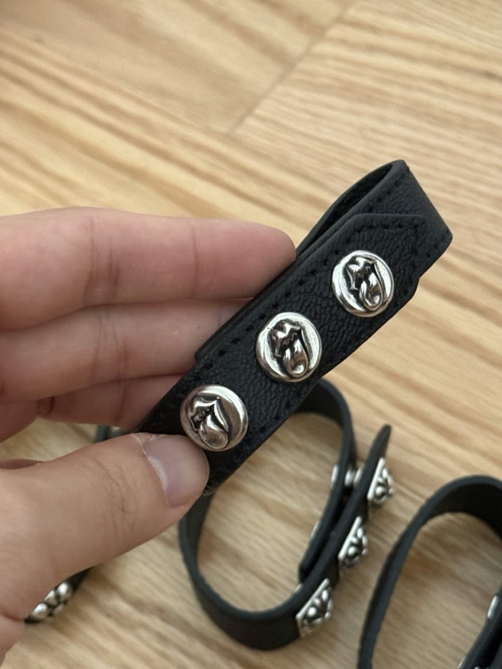 Chrome Hearts Black Leather Studded Bracelet with Rolling Stones Silver Accents